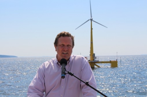 Assistant Secretary Dr. Danielson speaks in front of the VolturnUS floating wind turbine off the coast of Castine, Maine.