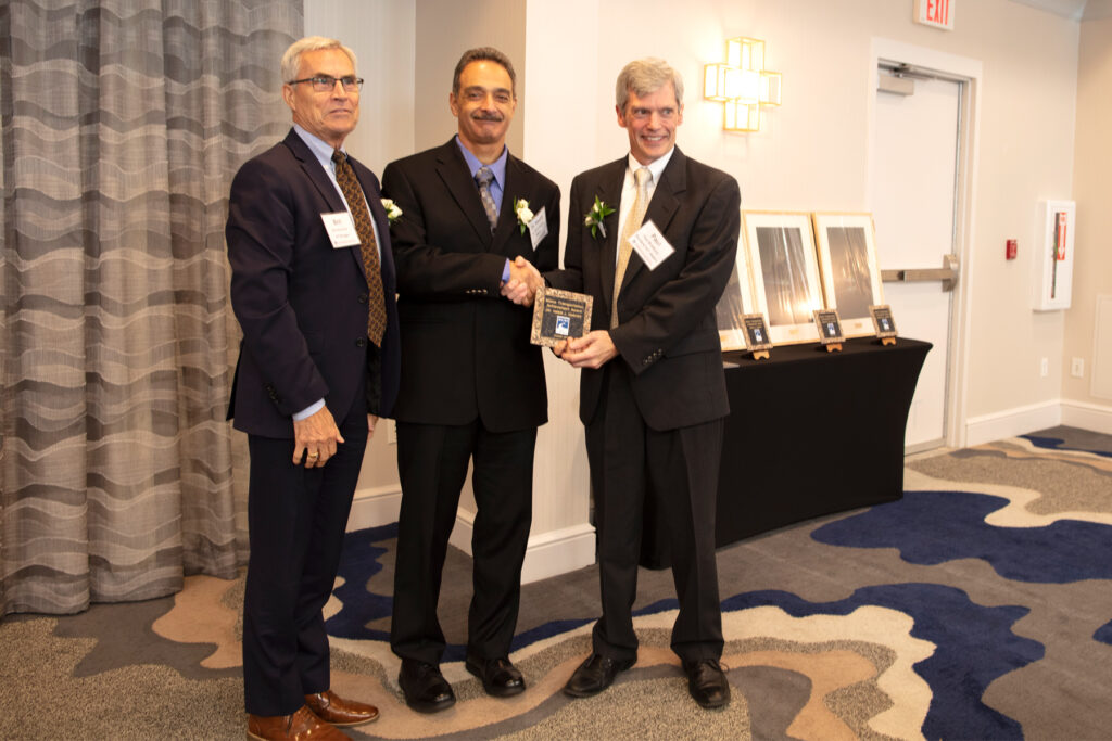 Dr. Dagher receives the 2019 Transportation Champion award from the Maine Better Transportation Association (MBTA) on Oct 4, 2019. Presenting the award to Dr. Dagher is MBTA President, Paul Bradbury (right) and Brit Svoboda (left), chairman and CEO, AIT Bridges.